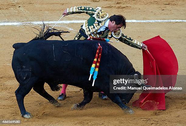 Spanish bullfighter Vicente Ruiz 'El Soro' performs during a bullfighting as part of the Las Fallas Festival in a bullfight on March 16, 2015 in...