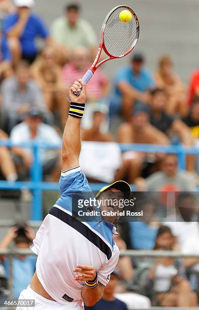 Carlos Berloq of Argentina makes a shot during a match between Argentina and Italy as part of day 3 of the Davis Cup at Patinodromo Stadium on...