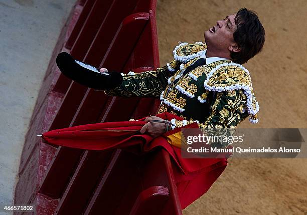 Spanish bullfighter Vicente Ruiz 'El Soro' performs during a bullfighting as part of the Las Fallas Festival in a bullfight on March 16, 2015 in...