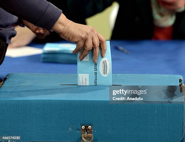 An Israeli citizen casts his vote at a polling station during legislative election in Jerusalem, Israel on March 17, 2015. Voting begin in Israels...