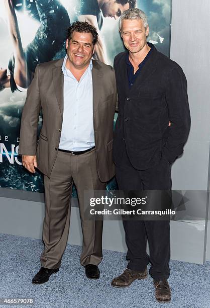 Executive producer Barry Waldman and director Neil Burger attend The Divergent Series' 'Insurgent' New York premiere at Ziegfeld Theater on March 16,...