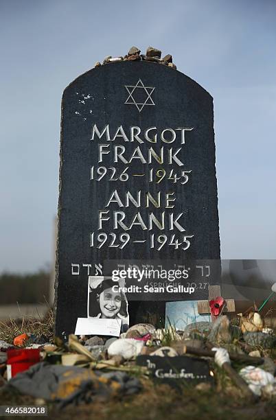 Symbolic tombstone commemorates Anne Frank and her sister Margot on the site of the former Bergen-Belsen concentration camp on March 17, 2015 in...