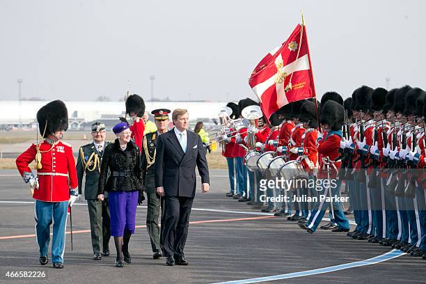 Queen Margrethe of Denmark, and King Willem Alexander of the Netherlands inspect The Guard of Honour on arrival at Copenhagen Airport at the start of...