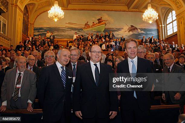 French Foreign Minister Laurent Fabius , Prince Albert II of Monaco and Norway's Foreign Minister Borge Brende pose for photographers ahead of the...