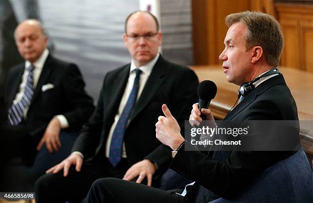French Foreign Minister Laurent Fabius , Prince Albert II of Monaco , with Norway's foreign minister Borge Brende attend a conference concerning...