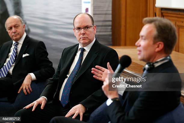 French Foreign Minister Laurent Fabius , Prince Albert II of Monaco , with Norway's foreign minister Borge Brende attend a conference concerning...