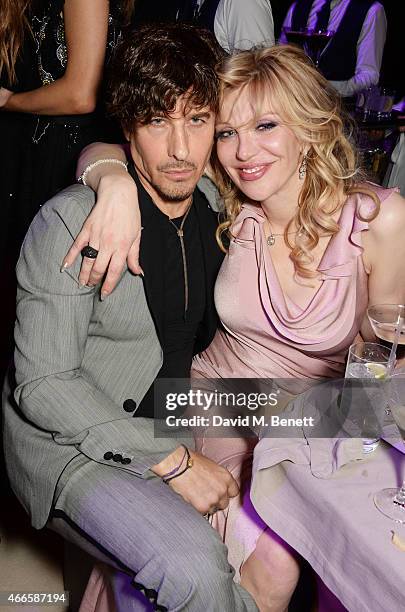 Steven Klein and Courtney Love attend the British Fashion Awards at the London Coliseum on December 1, 2014 in London, England.
