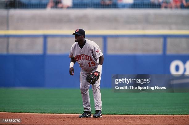 Cristian Guzman of the Minnesota Twins fields against the Chicago White Sox on April 21, 2001 at Comiskey Park II in Chicago, Illinois. The Twins won...