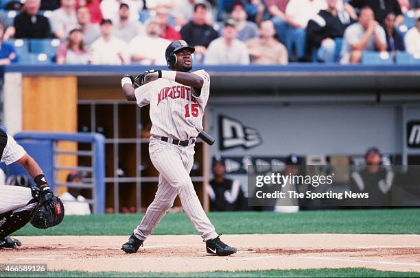 Cristian Guzman of the Minnesota Twins bats against the Chicago White Sox on April 21, 2001 at Comiskey Park II in Chicago, Illinois. The Twins won...