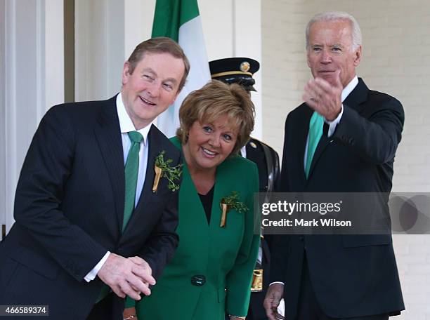 Vice President Joseph Biden welcomes Prime Minister Enda Kenny of Ireland and his wife Fionnuala Kenny to the Naval Observatory on March 17, 2015 in...