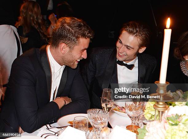 Oliver Jackson Cohen and Douglas Booth attend the BFI London Film Festival IWC Gala Dinner in honour of the BFI at Battersea Evolution Marquee on...