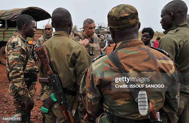 French army general Francesco Soriano , the commander of the French-led 'Operation Sangaris' in Central Africa, speaks with Centrafrican gendarmes...