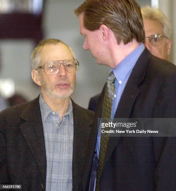Robert Durst is escorted through the Northampton court house in Easton, Penn. Durst is a suspect in his wife's disappearance 19 years ago, and is...