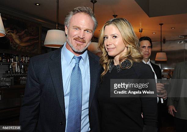 Actors Brian Bosworth and Mira Sorvino attend the Premiere of Pure Flix's "Do You Believe?" after party at Cleo Redbury Hotel on March 16, 2015 in...