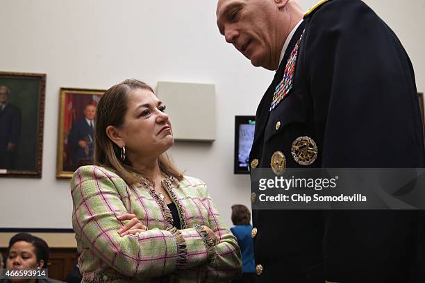 House Armed Services Committee member Rep. Loretta Sanchez talks with Army Chief of Staff Gen. Raymond Odierno before a hearing about the FY2016...