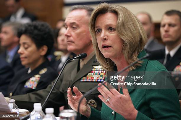 Secretary of the Air Force Deborah Lee James testifies with Vice Chief of Naval Operations Adm. Michelle Howard and Commandant of the Marine Corps...