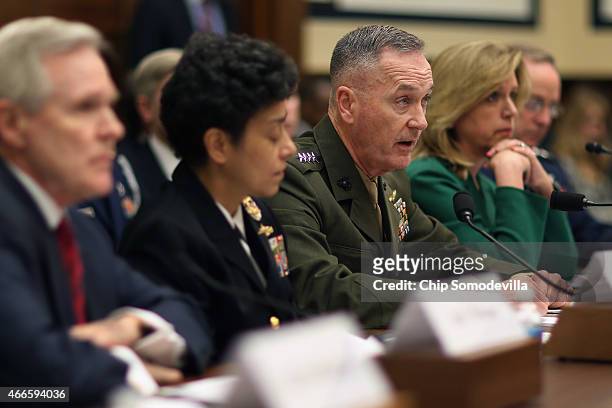 Commandant of the Marine Corps Gen. Joseph Dunford testifies with Secretary of the Navy Ray Mabus, Vice Chief of Naval Operations Adm. Michelle...