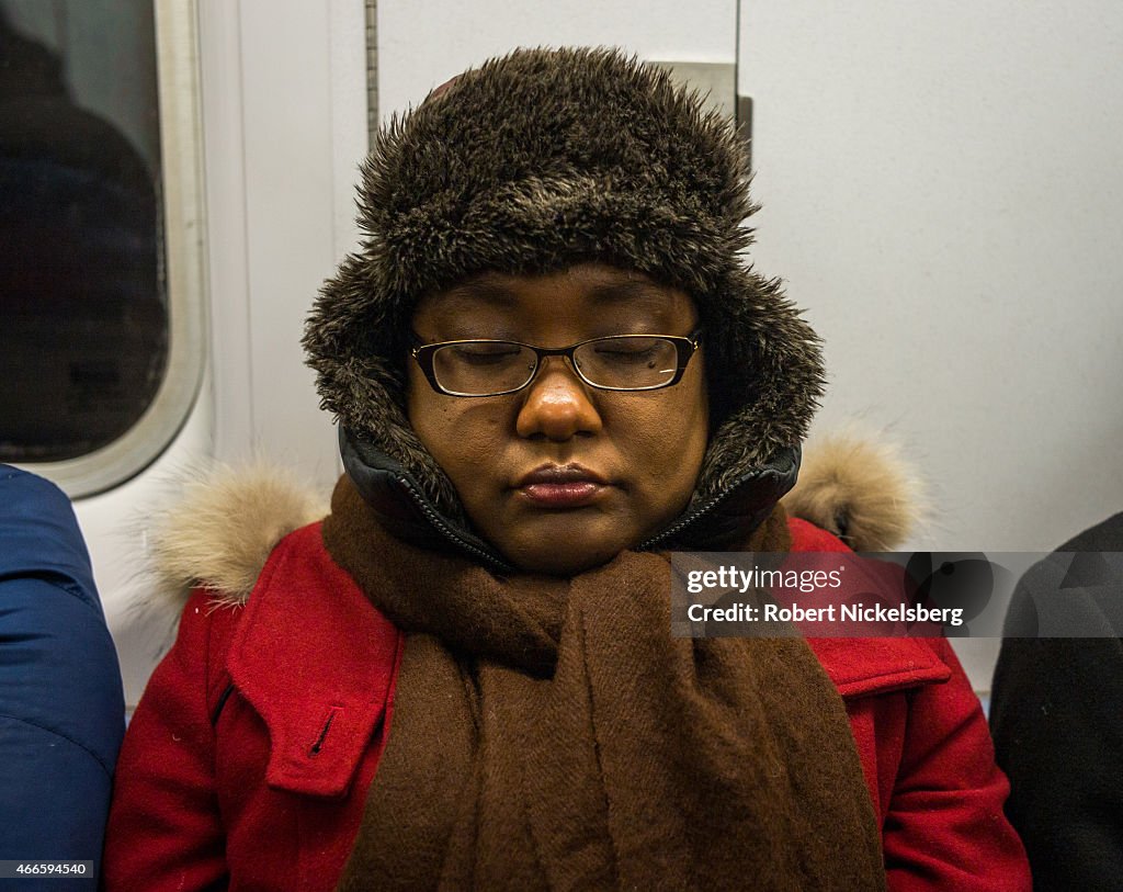 New York Subway Riders Bundle Up For Cold Weather