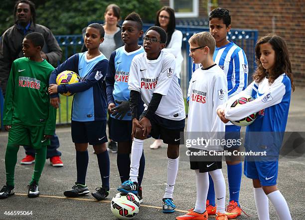 Nathaniel Clyne and Fran Kirby holds a Q & A with the children during the Premier League Players Kit Scheme Launch at Allen Edward Primary School on...