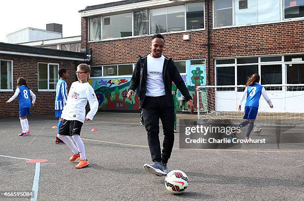 Nathaniel Clyne takes part in activities with the school children during the Premier League Players Kit Scheme Launch at Allen Edward Primary School...