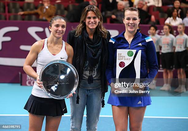 Anastasia Pavlyuchenkova of Russia poses with the trophy after defeating Sara Errani of Italy in the final during the 22nd Open GDF Suez held at the...