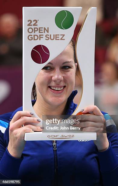 Anastasia Pavlyuchenkova of Russia poses with the trophy after defeating Sara Errani of Italy in the final during the 22nd Open GDF Suez held at the...