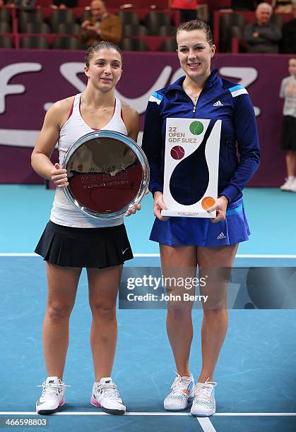 Anastasia Pavlyuchenkova of Russia poses with the trophy after defeating Sara Errani of Italy in the final during the 22nd Open GDF Suez held at the...