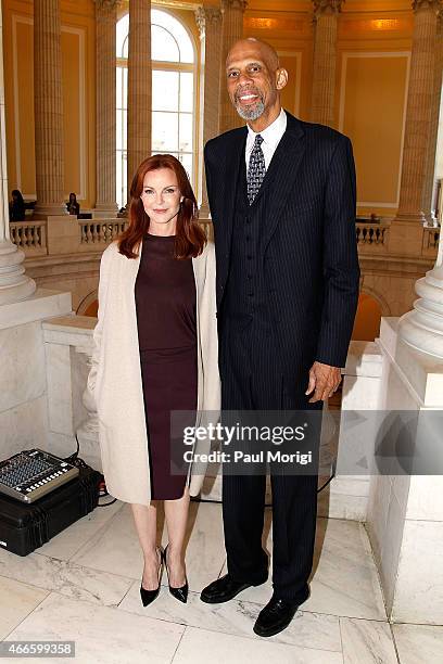 Actress Marcia Cross and NBA hall-of-famer Kareem Abdul-Jabbar pose for a photo at The American Cancer Society Cancer Action Network and Stand Up To...