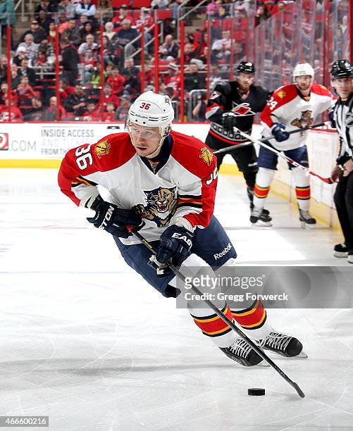 Jussi Jokinen of the Florida Panthers skates with the puck during their NHL game against the Carolina Hurricanes at PNC Arena on March 14, 2015 in...