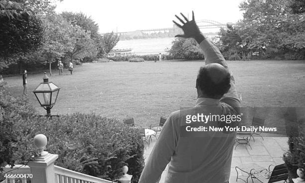 Mayor Ed Koch thrills passing Circle Line passengers by greeting them with a wave from back door of Gracie Mansion.