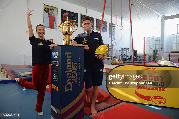 Gymnast Andreea Raducan with Rugby Player Ronan O'Gara pose for the camera as they take on the DHL Rugby v's the World Challenge during the Rugby...