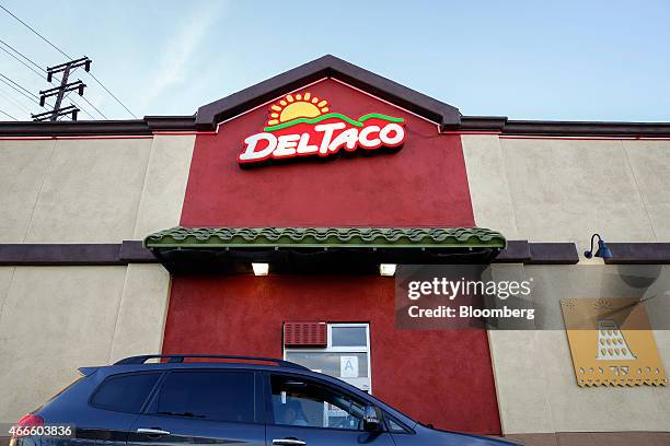 Customer orders at the drive-thru of a Del Taco restaurant in Gardena, California, U.S., on Saturday, March 14, 2015. Del Taco, the Mexican chain...