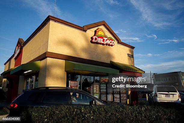 Customer orders at the drive-thru of a Del Taco restaurant in Gardena, California, U.S., on Saturday, March 14, 2015. Del Taco, the Mexican chain...