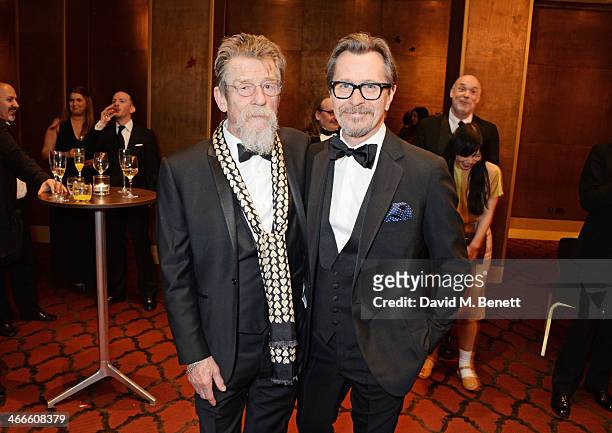 John Hurt and Gary Oldman attend the London Critics' Circle Film Awards at The Mayfair Hotel on February 2, 2014 in London, England.