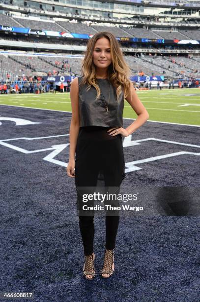 Model Chrissy Teigen attends the Pepsi Super Bowl XLVIII Pregame Show at MetLife Stadium on February 2, 2014 in East Rutherford, New Jersey.