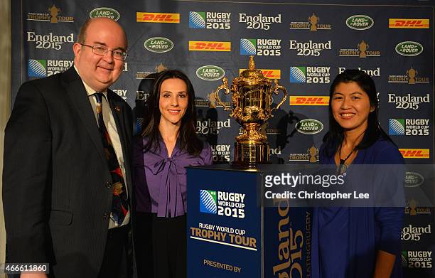 The British Ambassador to Romania Mr Paul Brummell, Romanian Gymnast Andreea Raducan and his wife Adriana pose for the camera with the Webb Ellis Cup...