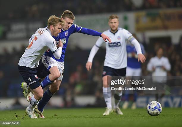 Freddie Sears of Ipswich Town battles with Tim Ream of Bolton Wanderers during the Sky Bet Championship match between Ipswich Town and Bolton...