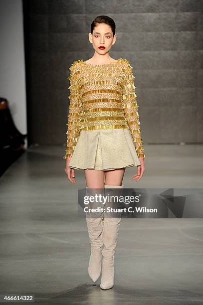 Model walks the runway at the Osgur Masur show during Mercedes Benz Fashion Week Istanbul FW15 on March 17, 2015 in Istanbul, Turkey.