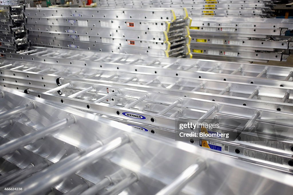 Ladder Layout Manufacturing Assembled aluminum ladders sit stacked on the factory floor at a ...