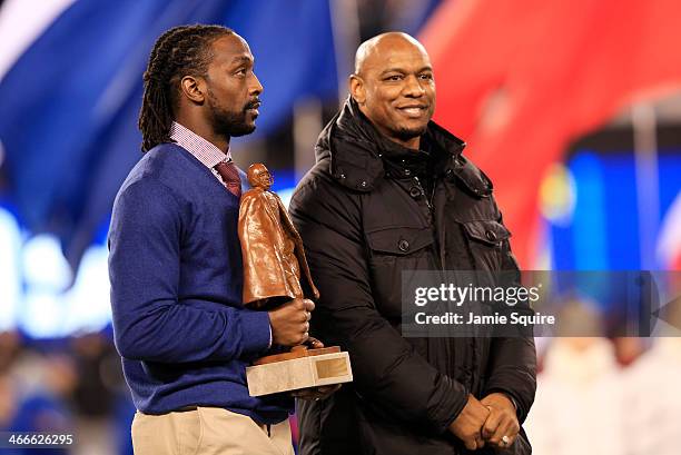 Charles Tillman wins Walter Payton NFL Player of Year trophy prior to Super Bowl XLVIII at MetLife Stadium on February 2, 2014 in East Rutherford,...