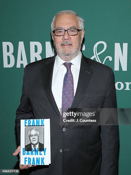 Former member of the U.S. House of Representatives Barney Frank poses for a photo with a copy of his new book "Frank: A Life In Politics From The...