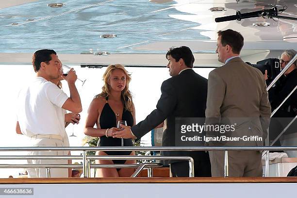 Leonardo DiCaprio, Kyle Chandler and Madison McKinley are seen on the set of 'The Wolf of Wall Street' on September 24, 2012 in New York City.