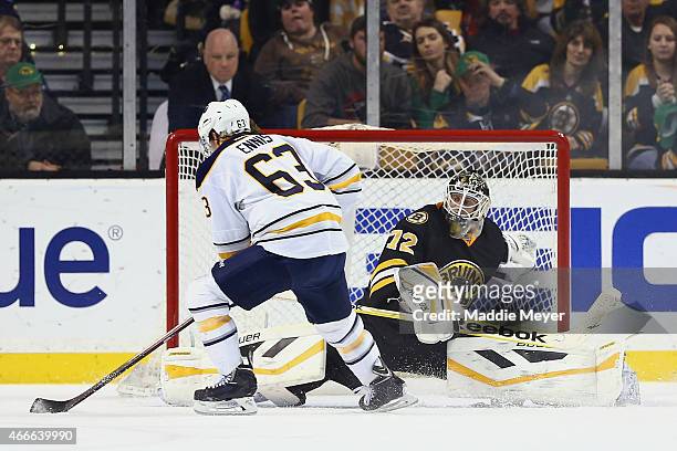 Tyler Ennis of the Buffalo Sabres takes a shot on goal against Niklas Svedberg of the Boston Bruins during a shootout at TD Garden on March 17, 2015...