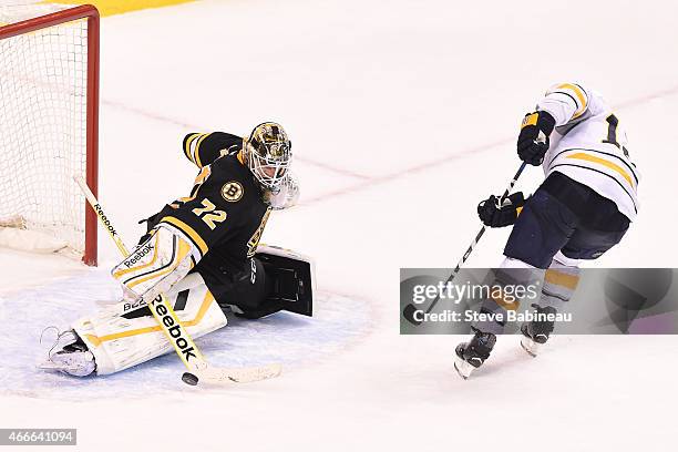 Niklas Svedberg of the Boston Bruins makes a save against Brian Gionta of the Buffalo Sabres at the TD Garden on March 17, 2015 in Boston,...