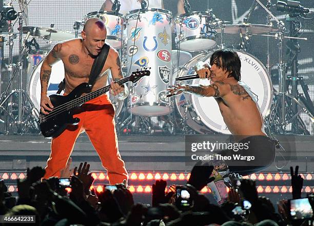 Flea and Anthony Kiedis of the Red Hot Chili Peppers perform during the Pepsi Super Bowl XLVIII Halftime Show at MetLife Stadium on February 2, 2014...