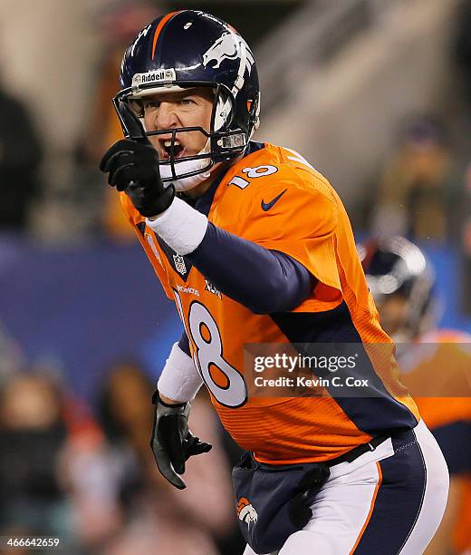 Quarterback Peyton Manning of the Denver Broncos reacts in the third quarter against the Seattle Seahawks during Super Bowl XLVIII at MetLife Stadium...