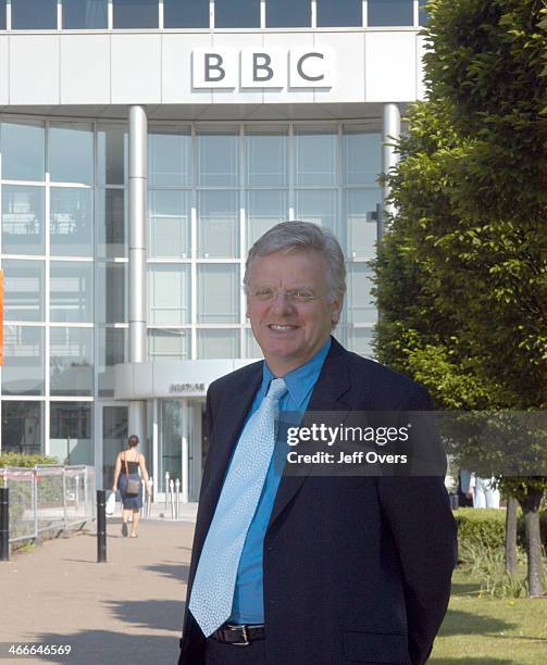 Michael Grade stands in front of the BBC White City building, with the BBC logo visible behind him, on his first morning as the Chairman of the BBC,...