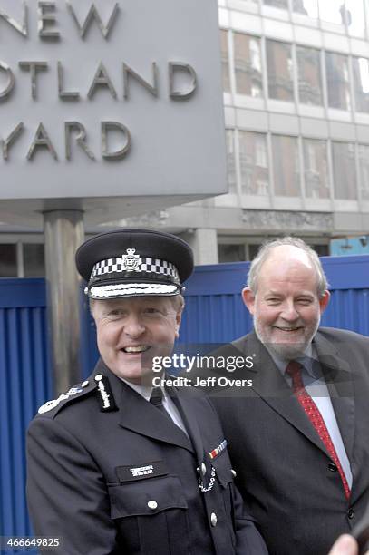 Sir Ian Blair, the new Commissioner of the Metropolitan Police, is seen here outside New Scotland Yard on his first day in office with Home Secretary...