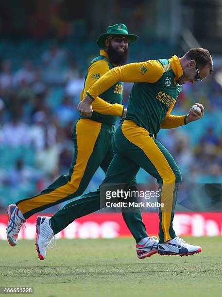 Faf du Plessis of South Africa celebrates taking the catch to dismiss Tillakaratne Dilshan of Sri Lanka during the 2015 ICC Cricket World Cup match...