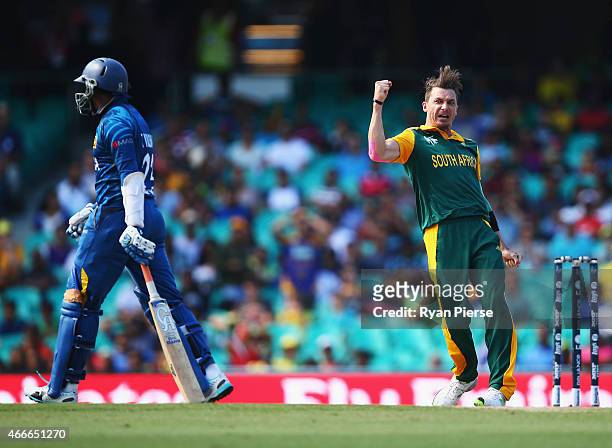 Dale Steyn of South Africa celebrates after taking the wicket of Tillakaratne Dilshan of Sri Lanka during the 2015 ICC Cricket World Cup Quarter...